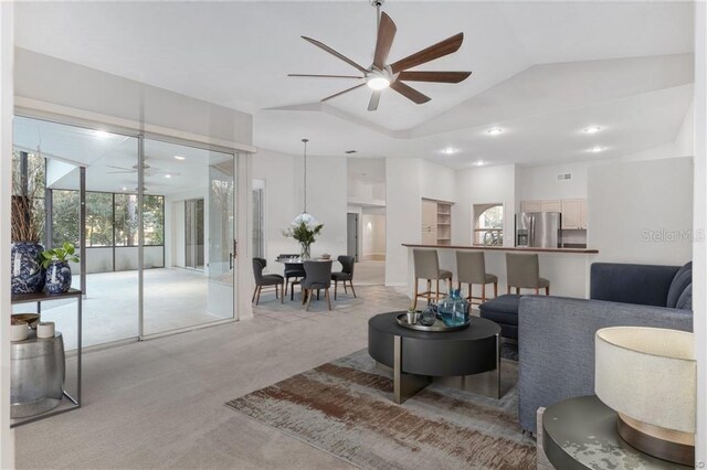 2843 W Elm Blossom St, Beverly Hills, FL 34465 - living area with a ceiling fan, light carpet, lofted ceiling, and recessed lighting