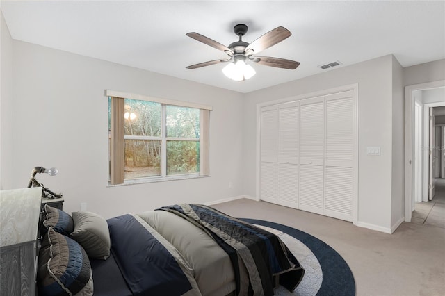 2843 W Elm Blossom St, Beverly Hills, FL 34465 - bedroom with light carpet, a closet, and ceiling fan