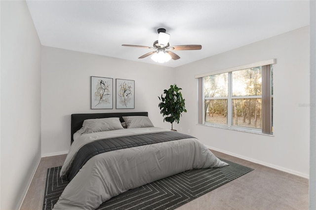 2843 W Elm Blossom St, Beverly Hills, FL 34465 - carpeted bedroom featuring baseboards and a ceiling fan