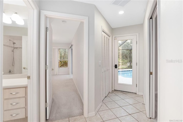 2843 W Elm Blossom St, Beverly Hills, FL 34465 - hall with baseboards and light tile patterned floors