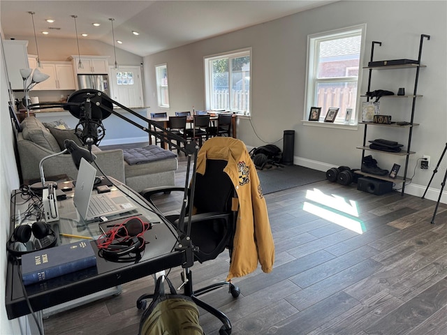 office space with dark hardwood / wood-style floors and vaulted ceiling