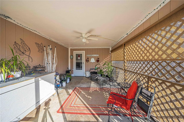 view of patio / terrace featuring ceiling fan