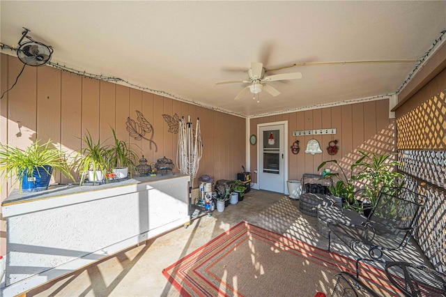 view of patio with ceiling fan