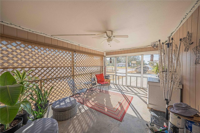 sunroom / solarium with ceiling fan