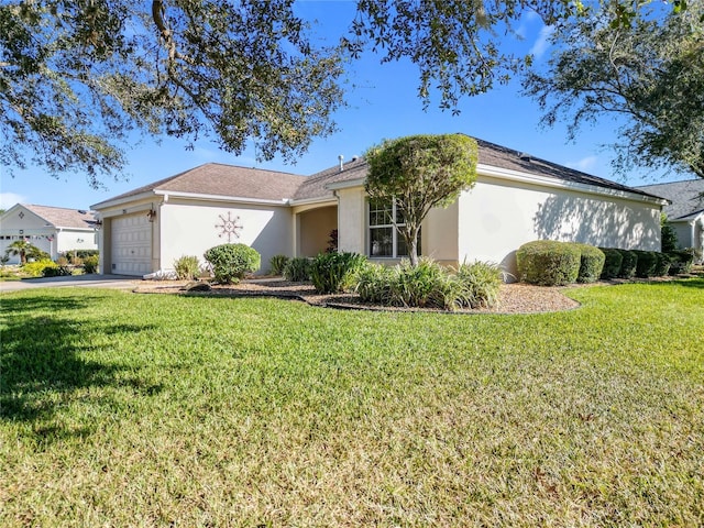 ranch-style house with a front yard and a garage