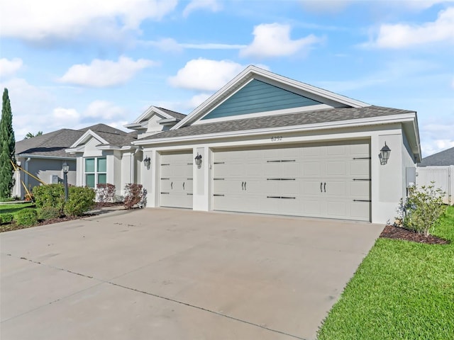 ranch-style home with a garage