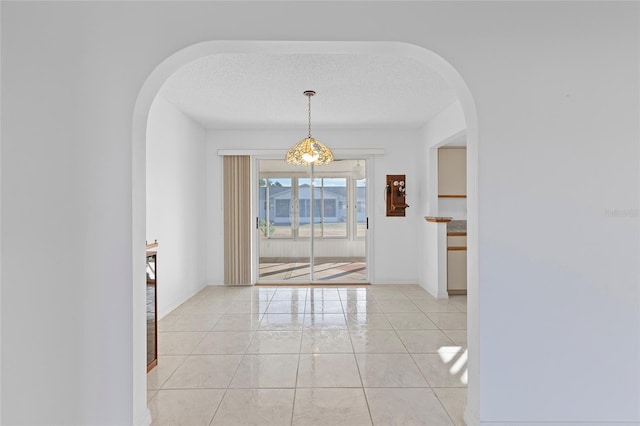 interior space featuring a textured ceiling