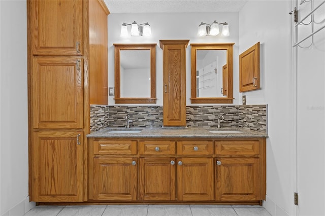 bathroom featuring decorative backsplash, a textured ceiling, and tile patterned floors