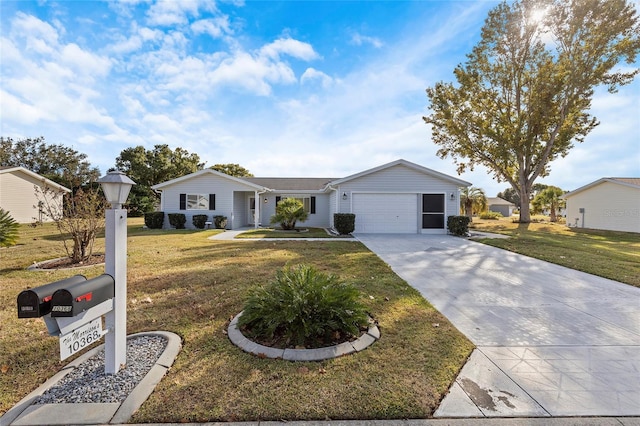 ranch-style house featuring a front yard and a garage