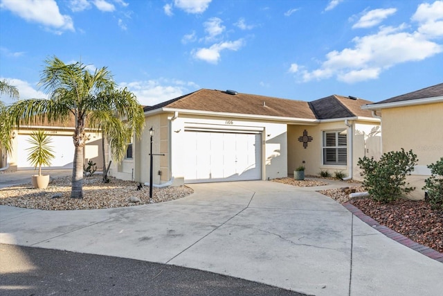 ranch-style home featuring a garage