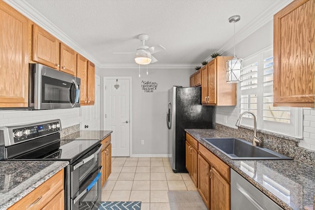 kitchen featuring backsplash, stainless steel appliances, ornamental molding, and sink