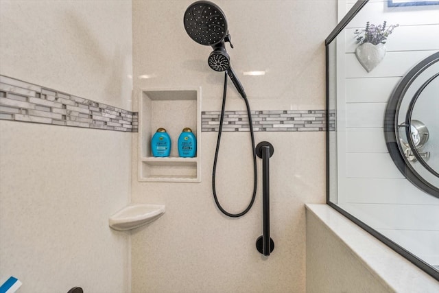 interior details featuring walk in shower