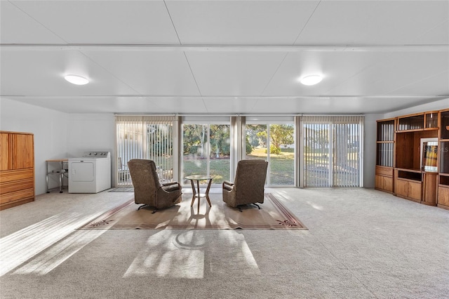 sunroom / solarium featuring washer / clothes dryer