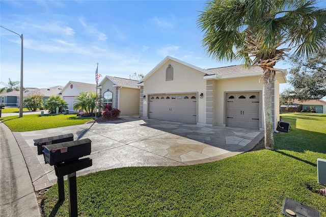 ranch-style home featuring a garage and a front lawn