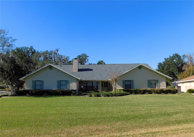 ranch-style house with a front yard