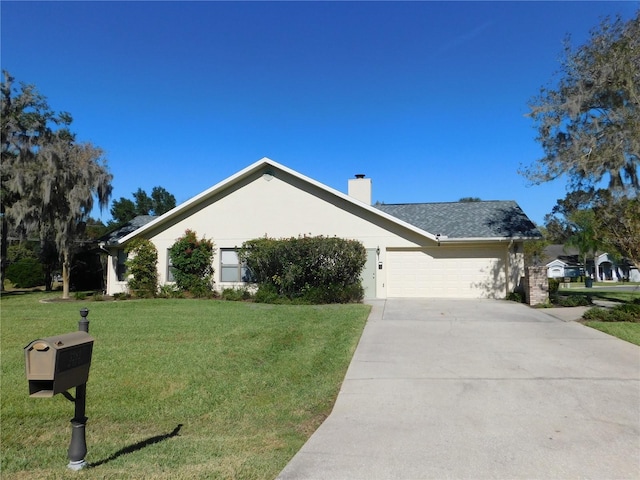 ranch-style house with a garage and a front lawn