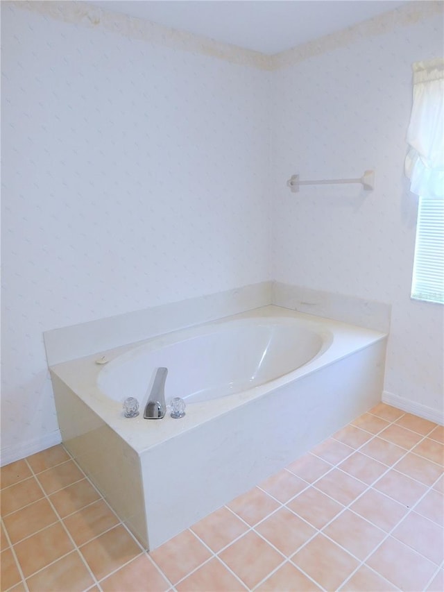 bathroom featuring tile patterned flooring and a bathtub