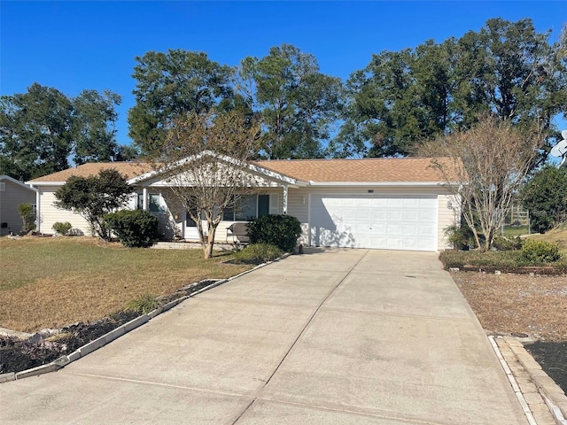 single story home featuring a front yard and a garage