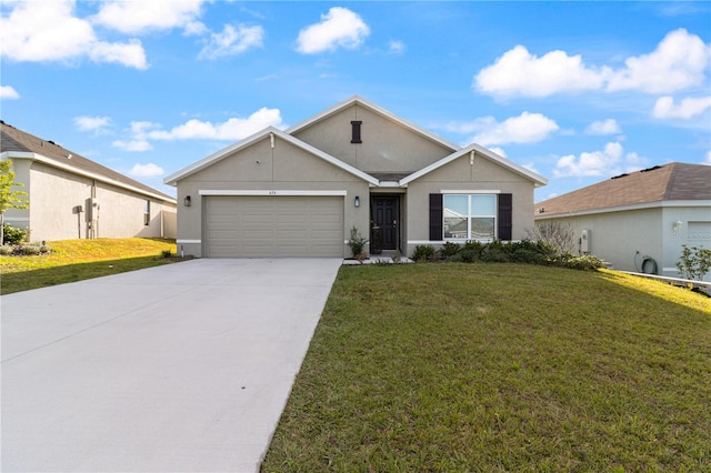 single story home with a garage and a front lawn