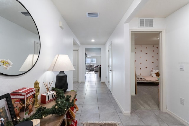 hallway featuring light tile patterned flooring