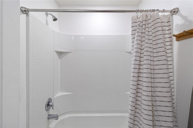 bathroom featuring shower / bath combo with shower curtain