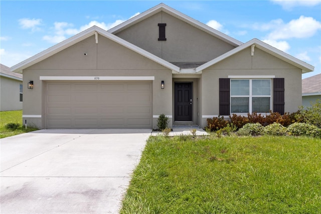 ranch-style home featuring a garage and a front lawn