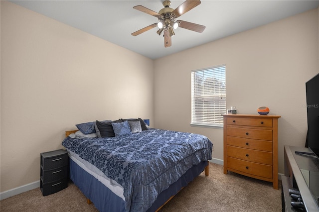 bedroom featuring ceiling fan and carpet floors