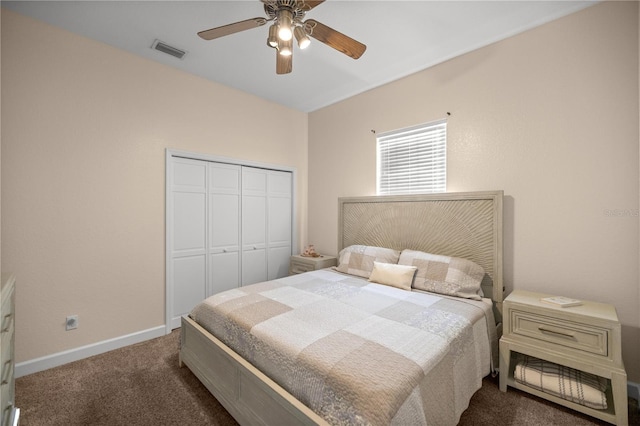 bedroom with ceiling fan, a closet, and dark carpet