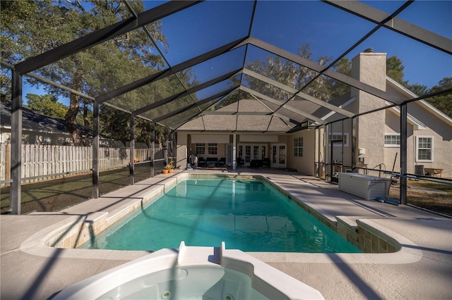 view of pool featuring a patio area and a lanai