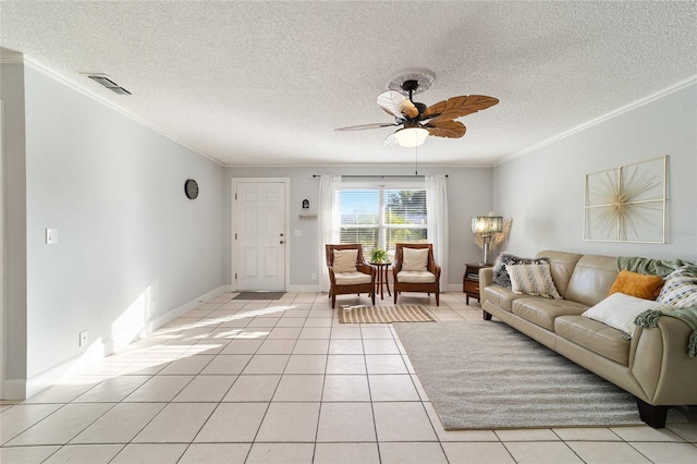 living room with crown molding, light tile patterned flooring, and a textured ceiling