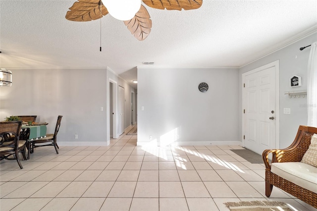 interior space with crown molding and a textured ceiling