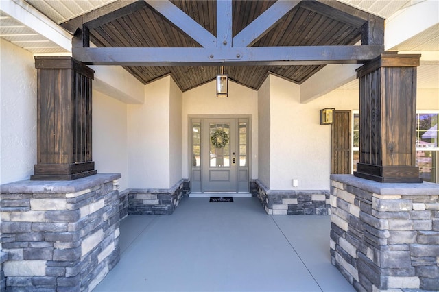 property entrance featuring covered porch