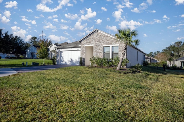 single story home with a garage and a front yard