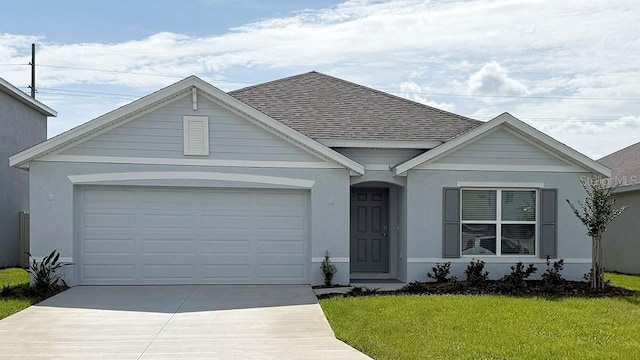 8838 SW 48th Ave, Ocala, FL 34476 - view of front of home featuring driveway, roof with shingles, a front lawn, a garage, and stucco siding