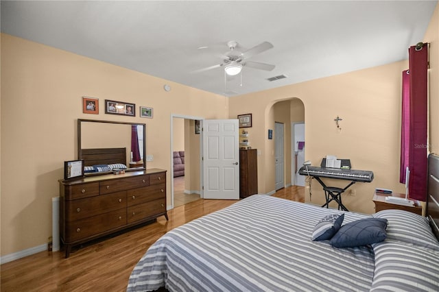 bedroom featuring light wood-type flooring and ceiling fan