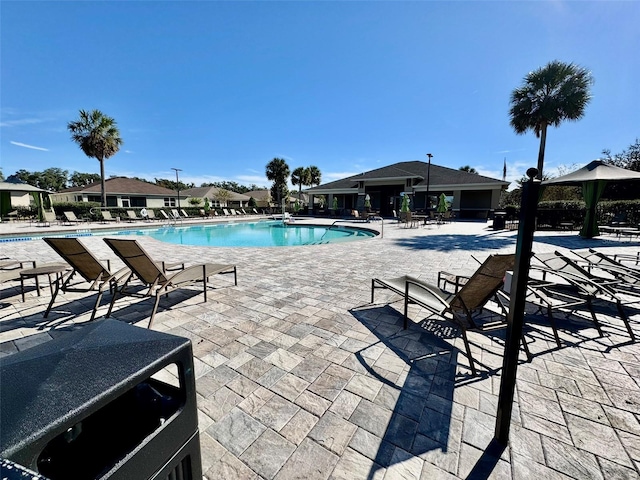 view of swimming pool with a patio area