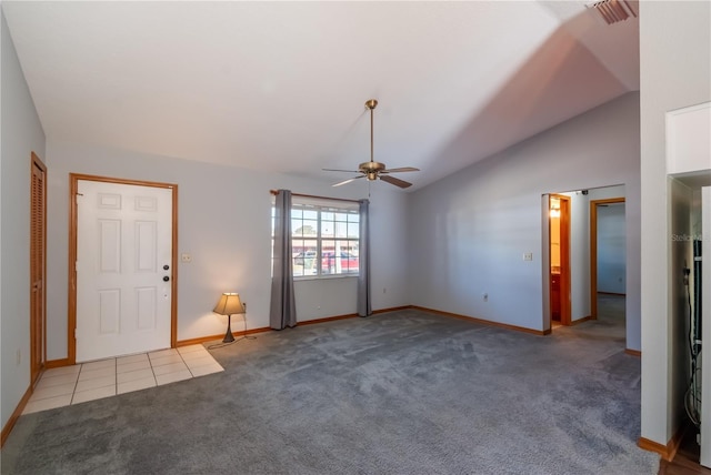 interior space featuring carpet floors, high vaulted ceiling, and ceiling fan