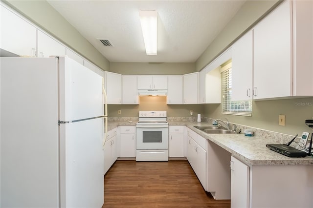 kitchen featuring hardwood / wood-style floors, white appliances, white cabinetry, and sink