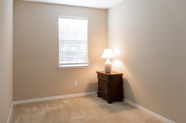 unfurnished bedroom with light carpet