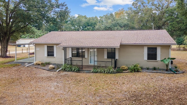 single story home featuring a porch