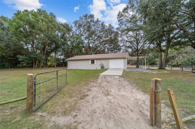 single story home featuring a carport and a front lawn