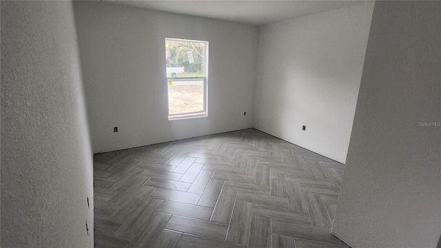 empty room featuring parquet floors