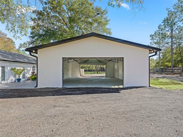 detached garage with fence