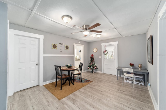 dining room featuring ceiling fan and light hardwood / wood-style flooring