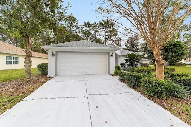 ranch-style house featuring a garage