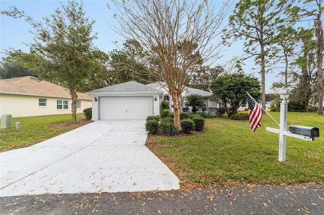 ranch-style home with a front yard and a garage