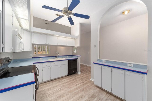 kitchen featuring white cabinetry, sink, dishwasher, light hardwood / wood-style flooring, and range