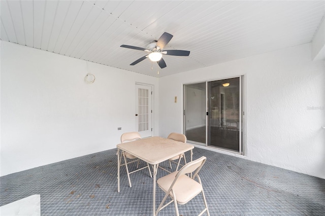 view of patio featuring ceiling fan