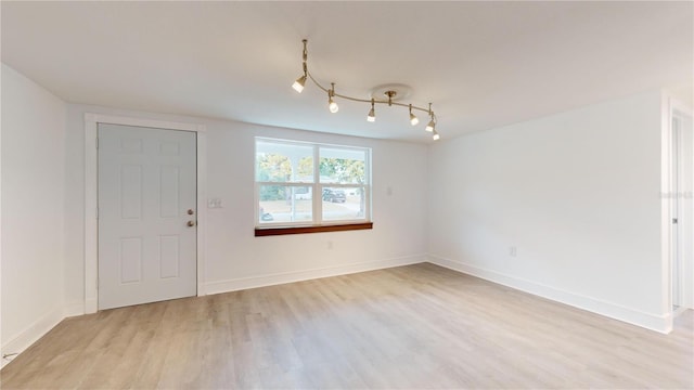 empty room featuring light hardwood / wood-style floors