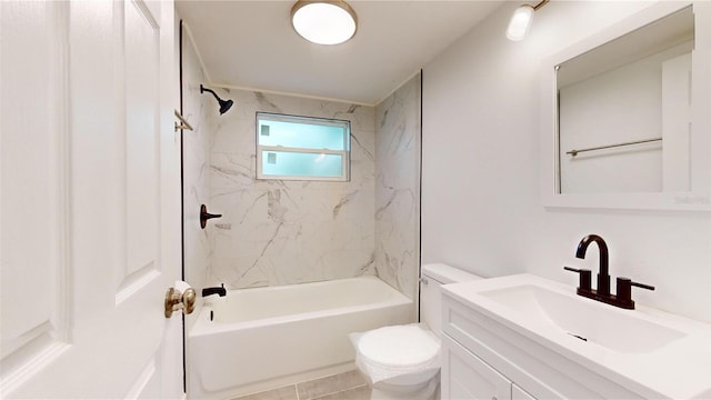 full bathroom with toilet, tile patterned floors, vanity, and tiled shower / bath combo